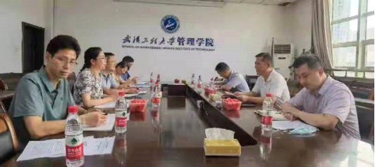 江夏区委政法委领导来校回复民进政协提案并座谈交流